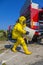 Man with briefcase in protective hazmat suit