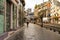 Man with brown coat walking on the street on Victoriei Way in downtown Bucharest, Romania, 2020