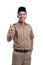 Man in brown khaki uniform showing thumb up