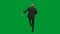 Man in business suit with horse head mask on green studio background. Businessman walking, bouncing and dancing. Concept