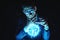 Man businessman holding hands over a blue glowing plasma sphere. Magic prediction and foresight in business and Finance