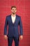 Man or businessman wear classic dark blue suit. Menswear and stylish wardrobe concept. Male fashion. Man formal clothing