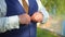 Man Buttoning Waistcoat Preparing to Wedding Groom