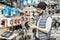 Man buying bicycle parts at the shop