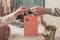 Man buying gift on Valentine`s Day in a female clothing store.