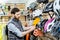 Man buying helmet in the bicycle shop