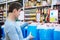 Man buys nonfreezing liquid in supermarket