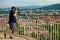 Man with camera taking photos of cityscape of Maribor, Lower Styria, Slovenia