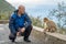 A man can see a monkey in a nature reserve in Gibraltar