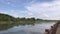 Man with canoe on the lake. Boating at lake. Cozy b-roll footage.