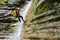 Man canyoning in Pyrenees, Spain.