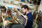 Man carpenter in furniture repair workshop