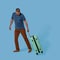 Man carries plastic suitcase holding it by folding handle. Cut out on blue background. Handsome Caucasian man goes on