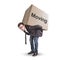 A man is carrying a large cardboard box with the word â€žmovingâ€œ on it