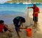 A man with a casting net in the caribbean