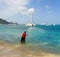 A man with a casting net in the caribbean