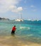 A man with a casting net in the caribbean