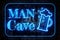 Man Cave Neon Sign on a Dark Wooden Wall