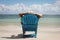 Man in chair on Caribbian beach