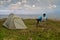 Man in the chair enjoy scenic view of Lake Superior from his campsite