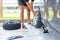 A man Change a flat car tire at car park with Tire maintenance, damaged car tyre