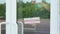 A man changes a sign that says OPEN for a sign that says CLOSED during the COVID-19 pandemic. Information plate on a