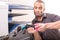 Man changing magenta cartridge in color printer