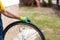 Man checking bicycle tire air pressure