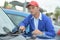 Man checking car windscreen wiper