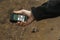 Man checking radiation with geiger counter