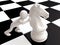 Man and Chess Horse Figure on Chessboard