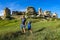 A man with a child on the background of a picturesque view of the Bakhchisarai sphinxes. Bakhchisarai. May 2021