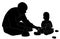 Man and child playing (silhouette)