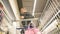 Man chooses fruits. Abstract blurred image of shopping mall and people. Shopping cart view defocused background with fruit.