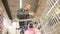 Man chooses fruits. Abstract blurred image of shopping mall and people. Shopping cart view defocused background with fruit.