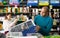 Man chooses a mammalian cage at pet store