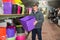 Man chooses pots clay pots in store