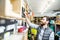 Man choosing bicycle saddle in the shop