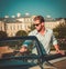 Man and classic convertible steering wheel