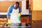 Man cleaning cooktop