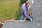 Man cleaning gutters