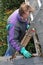 Man cleaning gutters