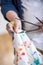 Man cleaning paint brushes in hands