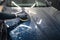 Man cleans car hood with circle sponge. Preparing auto for polishing. .Detailed car wash.