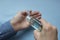 a man cleans his hands with an antiseptic.