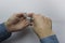 a man cleans his hands with an antiseptic.