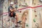 Man climber on artificial climbing wall