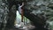 Man climbing bouldering route on the cliff