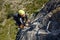 A man climbing a ferrata route in Calcena, Spanish mountains