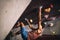 Man climbing indoor boulder wall